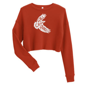 Brick red cropped sweatshirt with white crow silhouette filled with the words "Call of the Crow Quartet."